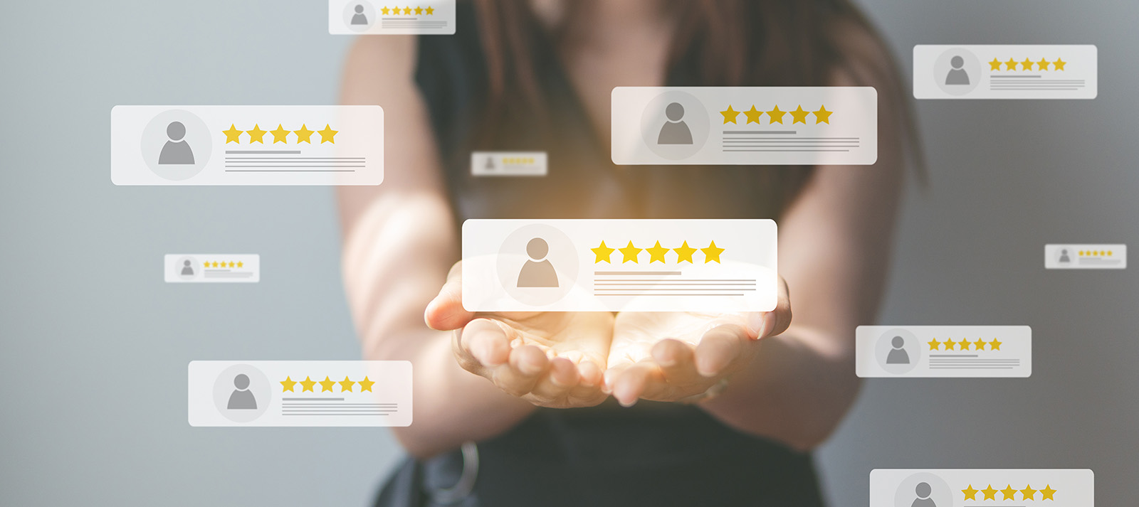 The image shows a person s hand reaching towards multiple floating icons with star ratings, suggesting an interactive interface for rating or reviewing items or services.