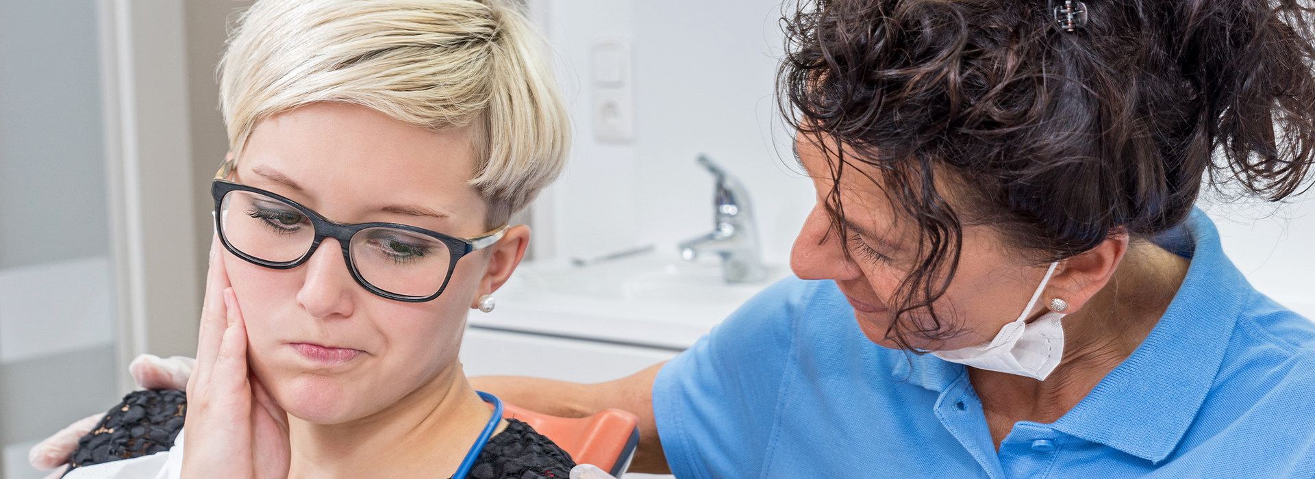 A split-screen photo showing a woman receiving dental treatment from a professional, with the  before  side showcasing a smile makeover.